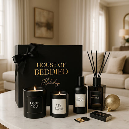 House of Beddieo holiday gift set with candles, diffuser, and decor items on a marble surface.